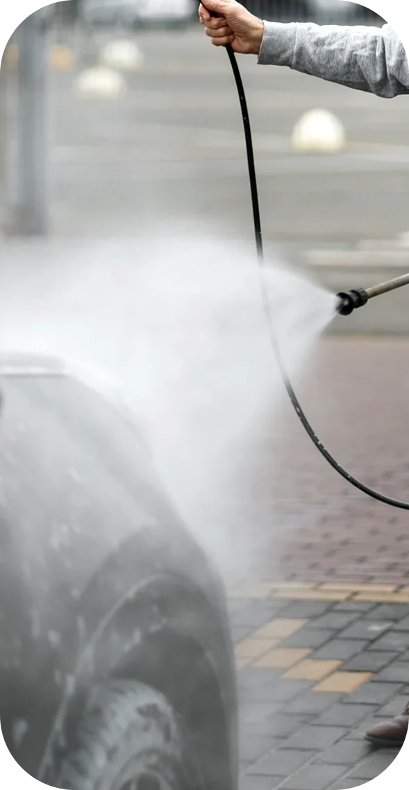 Megameet MC7 pressure washer cleaning a car